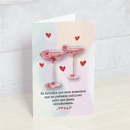 Postal UN BRINDIS POR ESOS MOMENTOS QUE NO PODEMOS PUBLICAR PERO JAMÁS OLVIDAREMOS. HAPPY MOTS