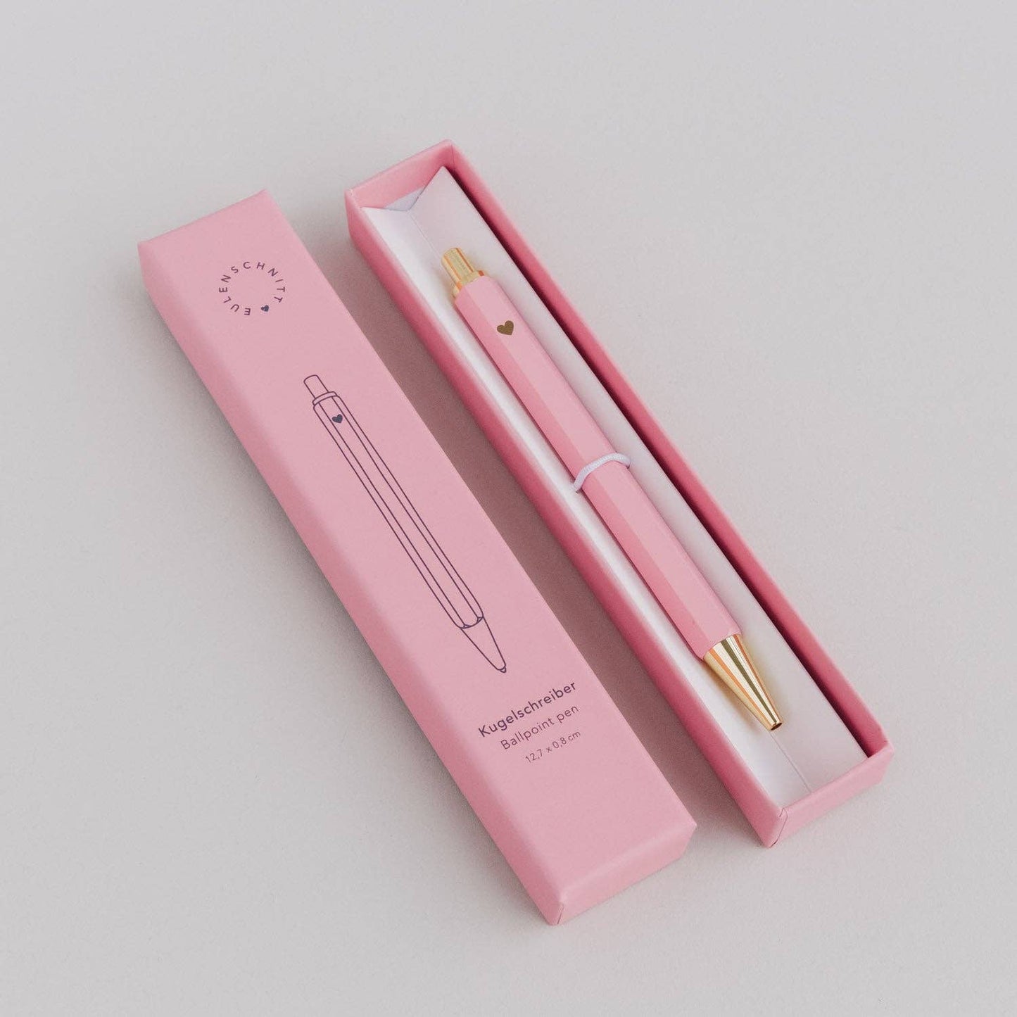 Bolígrafo rosa y dorado