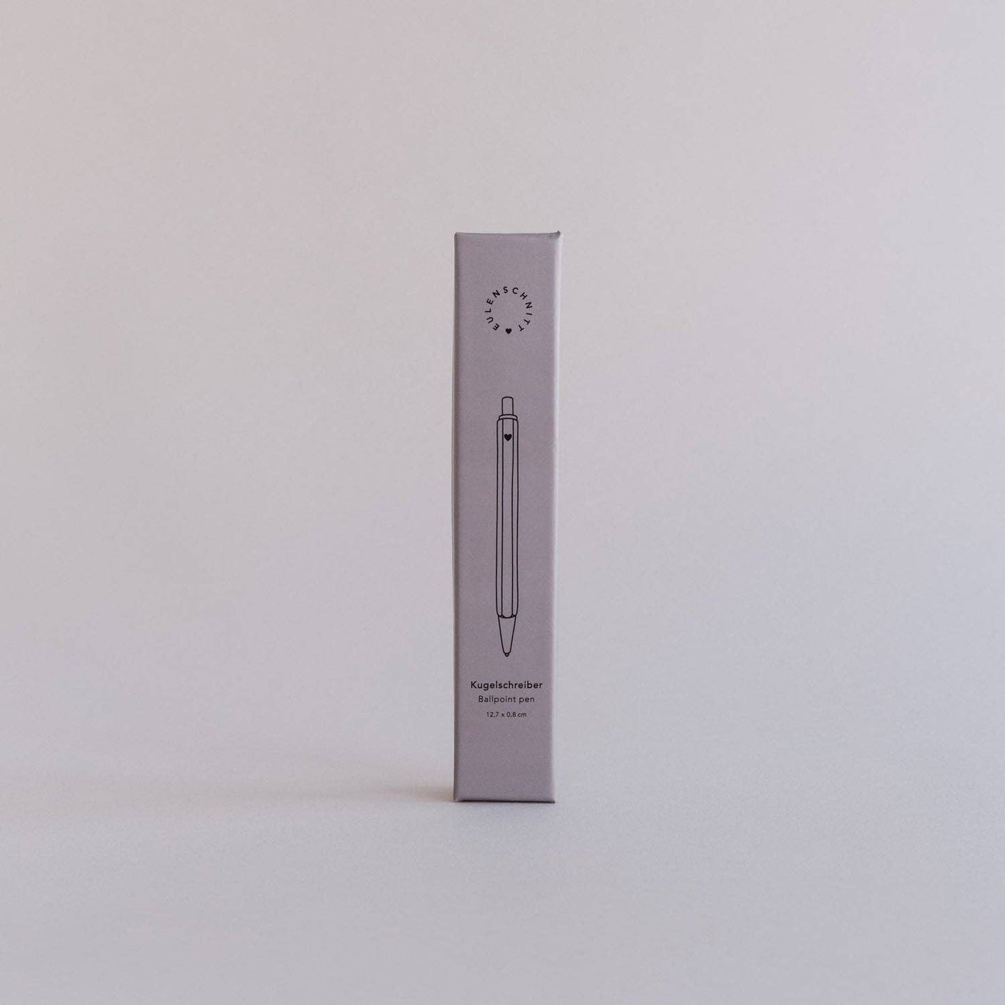 Bolígrafo gris de metal