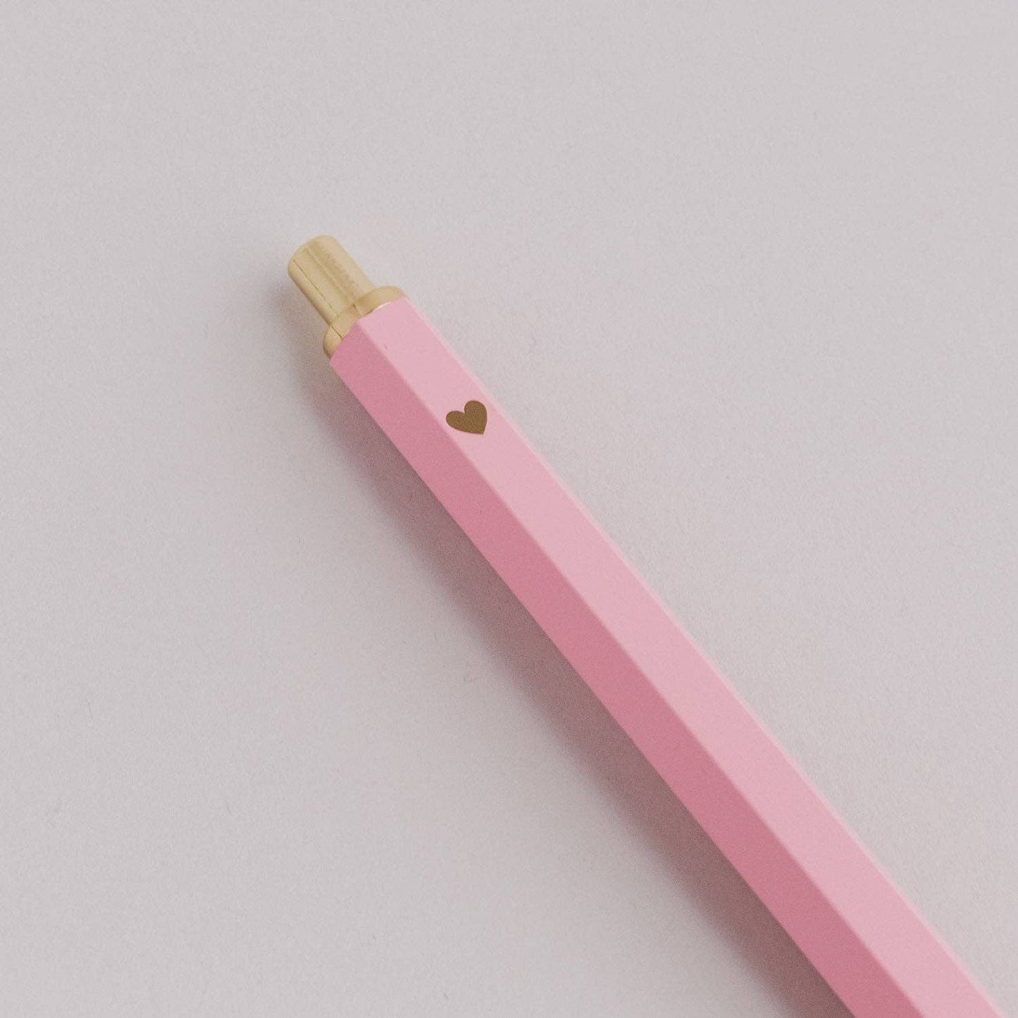 Bolígrafo rosa y dorado